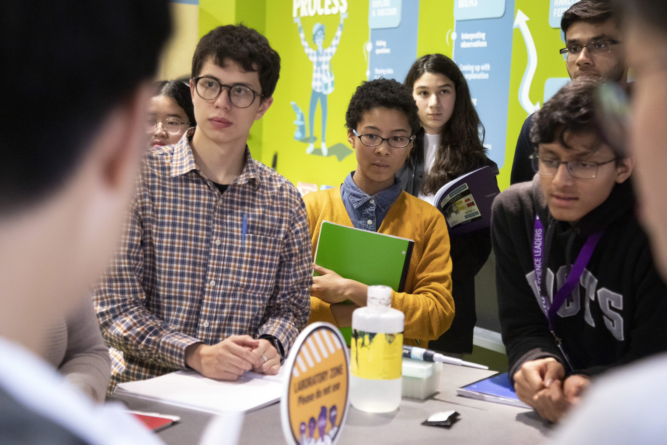 Yumai, a Future Science Leader, stands with her peers during a Research session in the Launchpad.