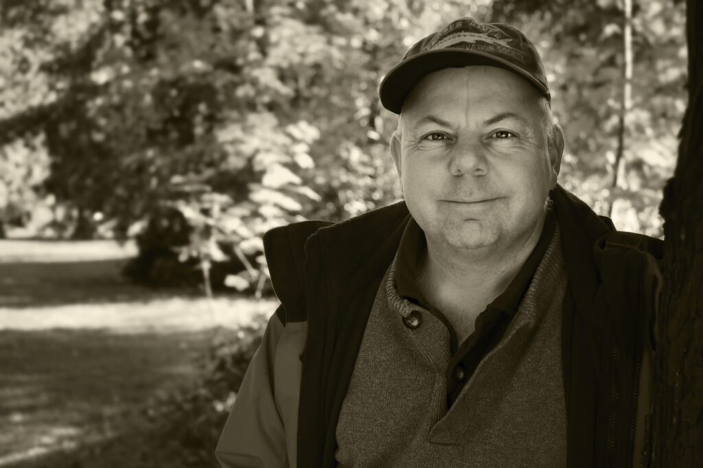 Dr. Andy Wright smiles at camera
