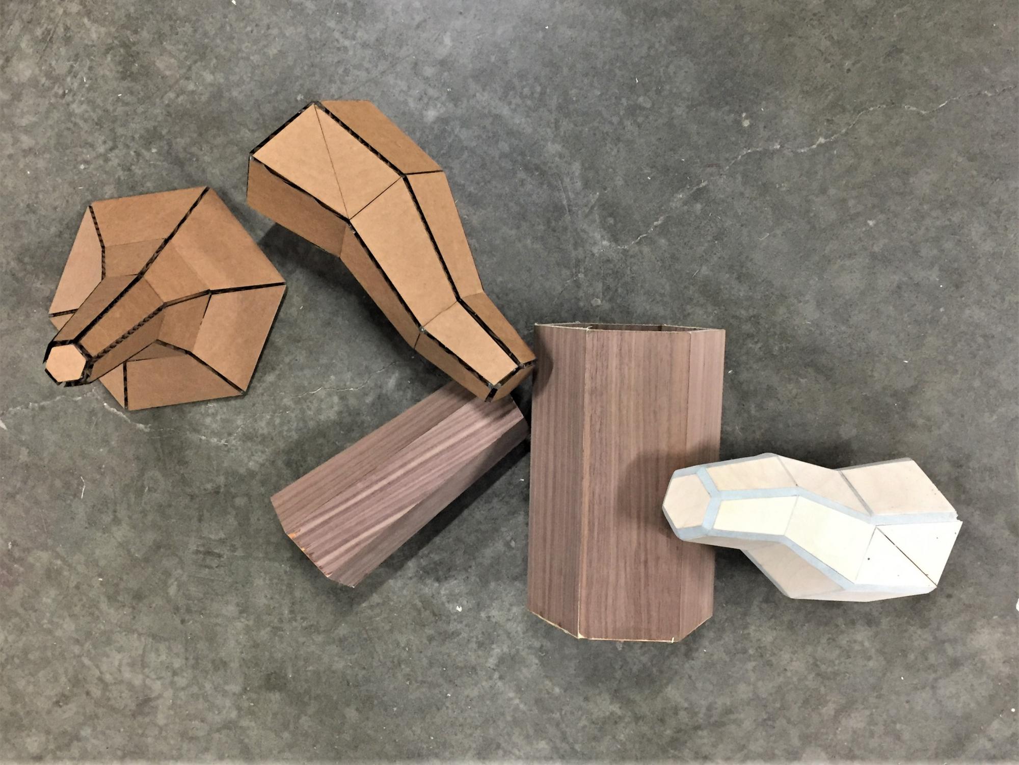 Ryan's prototypes for a smooth exterior that still implies a natural wood texture!